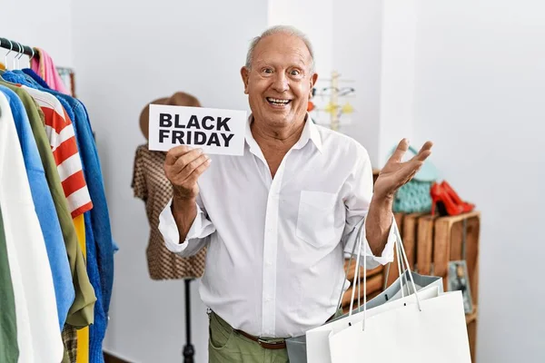 Senior Man Holding Black Friday Banner Retail Shop Celebrating Achievement — Photo