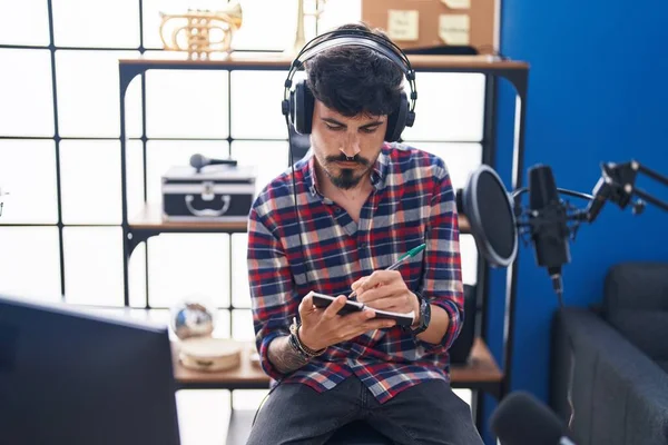 Young Hispanic Man Artist Listening Music Composing Song Music Studio — Stockfoto