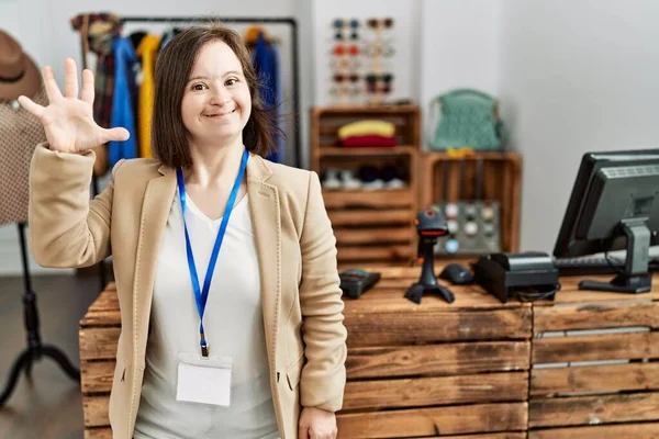 Young Syndrome Woman Working Manager Retail Boutique Showing Pointing Fingers — Fotografia de Stock