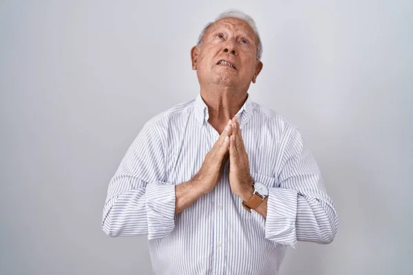 Senior Man Grey Hair Standing Isolated Background Begging Praying Hands — Φωτογραφία Αρχείου