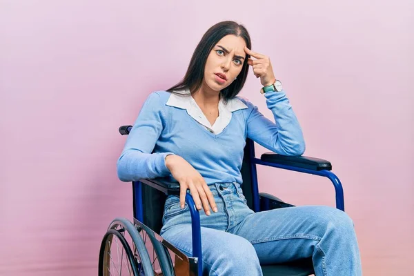 Beautiful Woman Blue Eyes Sitting Wheelchair Pointing Unhappy Pimple Forehead — Fotografia de Stock