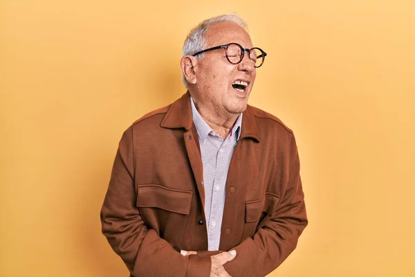 Senior Man Grey Hair Wearing Casual Jacket Glasses Hand Stomach — Stock fotografie