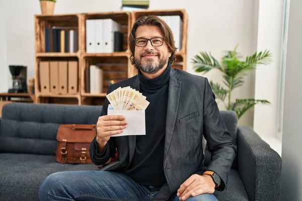 Handsome Middle Age Man Consultation Office Holding Dkk Banknotes Looking — Stockfoto