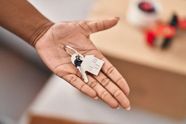 African American Woman Holding Key Standing New Home — ストック写真