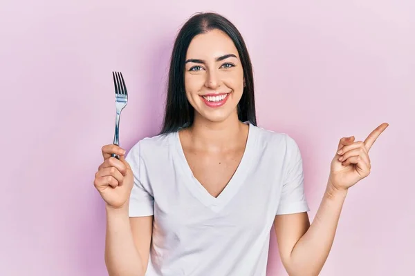 Beautiful Woman Blue Eyes Holding One Silver Fork Smiling Happy — Foto de Stock