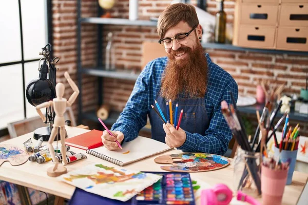 Young Redhead Man Artist Smiling Confident Drawing Notebook Art Studio — Stok fotoğraf