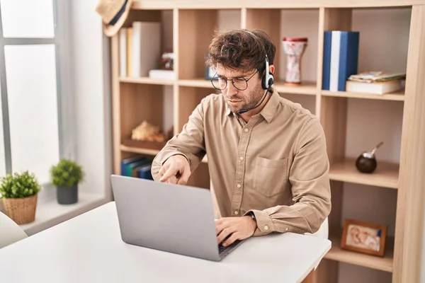 Hispanic Young Man Wearing Call Center Agent Headset Pointing Finger — Stock Photo, Image