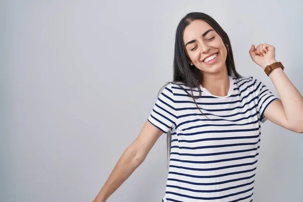Young Brunette Woman Wearing Striped Shirt Dancing Happy Cheerful Smiling — Stockfoto