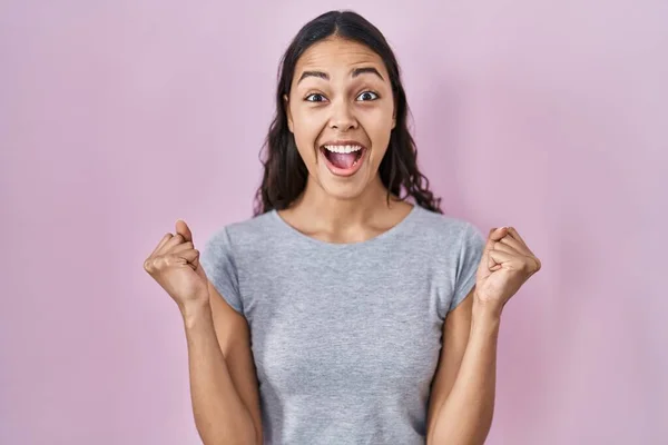 Young Brazilian Woman Wearing Casual Shirt Pink Background Celebrating Surprised — Stock Photo, Image