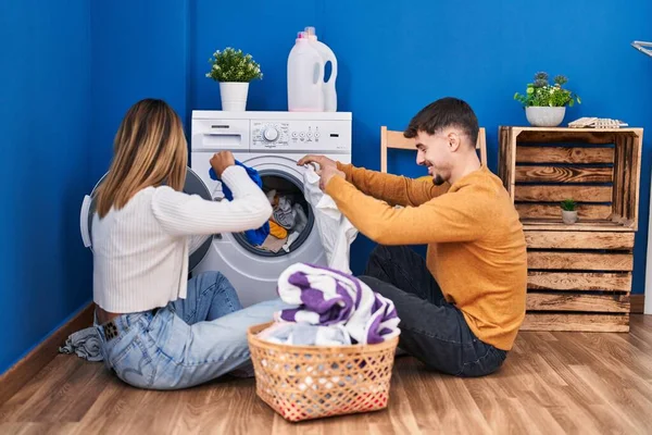 Young Man Woman Couple Washing Clothes Sitting Floor Laundry Room — ストック写真