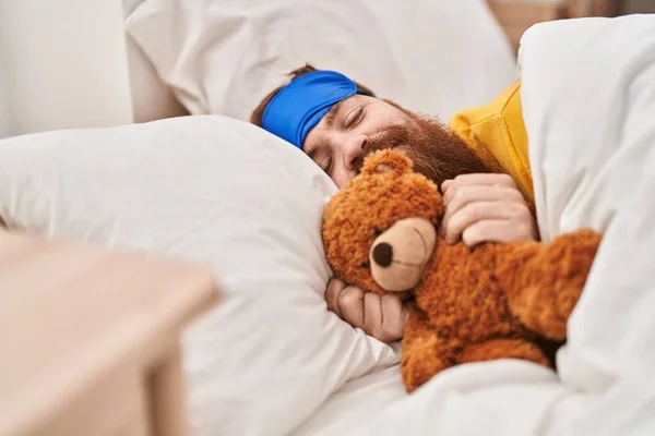 Young Redhead Man Lying Bed Hugging Teddy Bear Bedroom — Stock Fotó