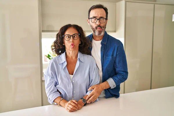 Middle Age Couple Standing Together Making Fish Face Lips Crazy — Stock Fotó