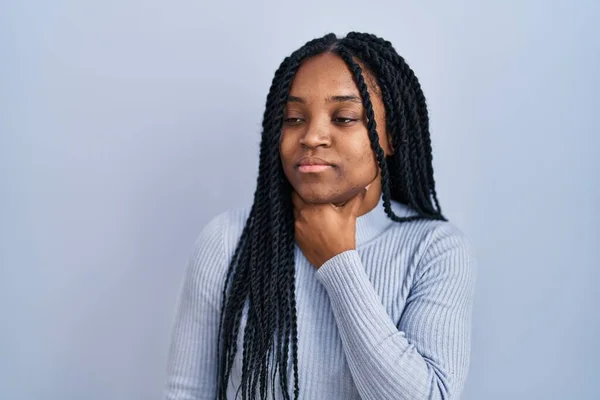 African American Woman Standing Blue Background Touching Painful Neck Sore — стоковое фото