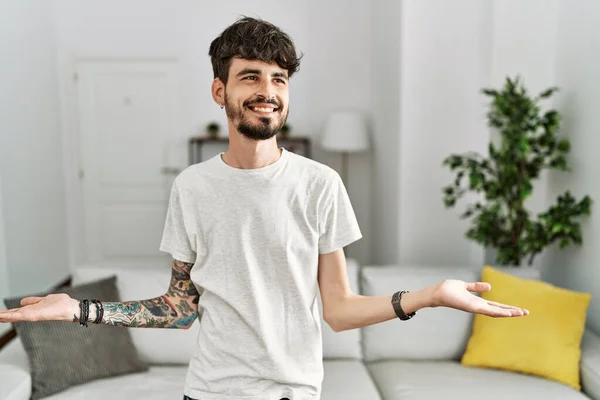 Hispanic Man Beard Living Room Home Smiling Showing Both Hands — Stock Fotó