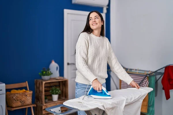 Young Woman Smiling Confident Ironing Clothes Laundry Room — ストック写真