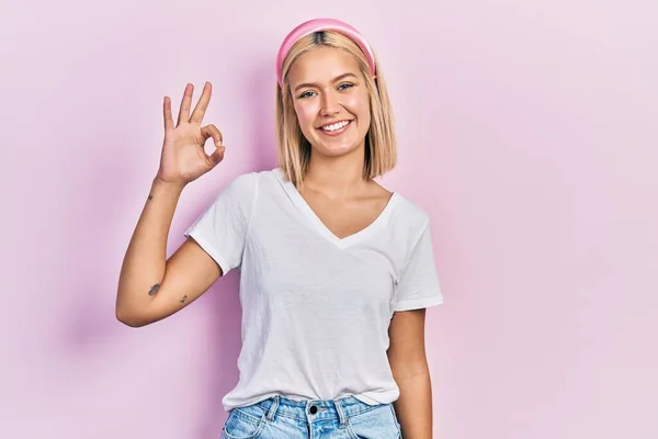 Beautiful Blonde Woman Wearing Casual White Shirt Smiling Positive Doing — 图库照片