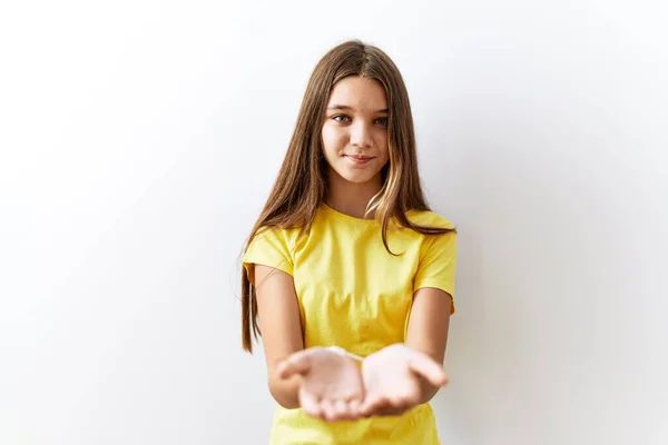 Young Brunette Teenager Standing Together Isolated Background Smiling Hands Palms — Stok fotoğraf