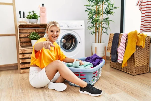 Young Caucasian Woman Putting Dirty Laundry Washing Machine Pointing You — Stockfoto