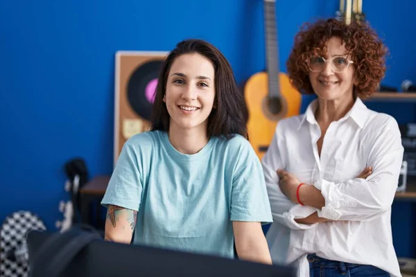 Two Women Musicians Smiling Confident Music Studio — Photo