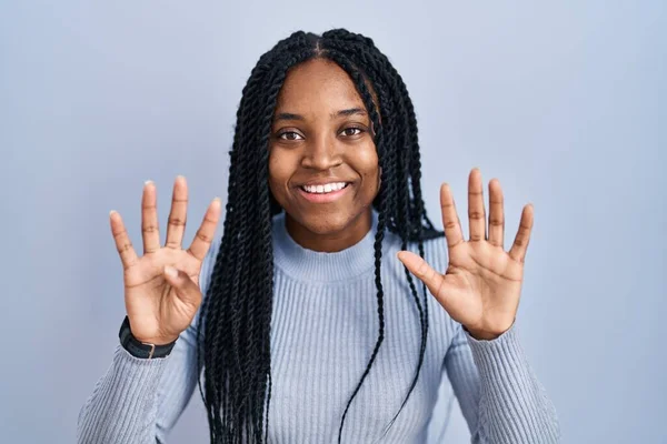African American Woman Standing Blue Background Showing Pointing Fingers Number — Photo