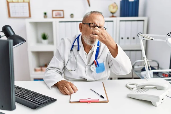 Mature Doctor Man Clinic Smelling Something Stinky Disgusting Intolerable Smell — Stockfoto