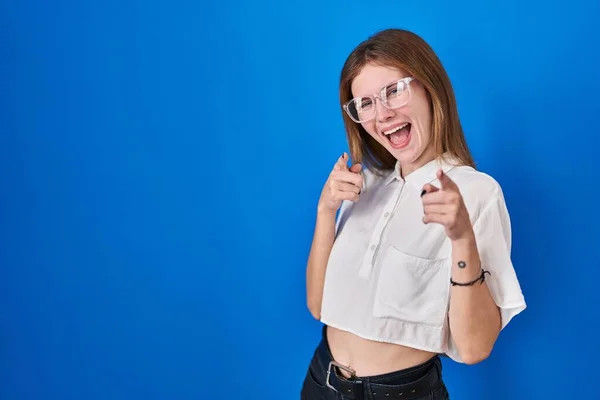 Beautiful Woman Standing Blue Background Pointing Fingers Camera Happy Funny — Zdjęcie stockowe