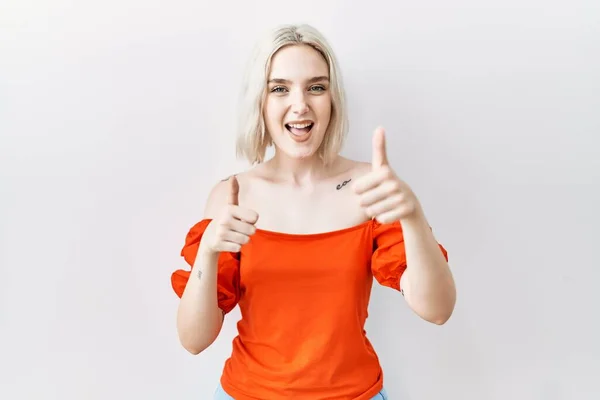 Young Caucasian Woman Standing Isolated Background Approving Doing Positive Gesture — Stockfoto