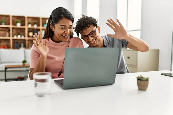 Young Latin Couple Smiling Happy Having Video Call Using Laptop — Stock fotografie