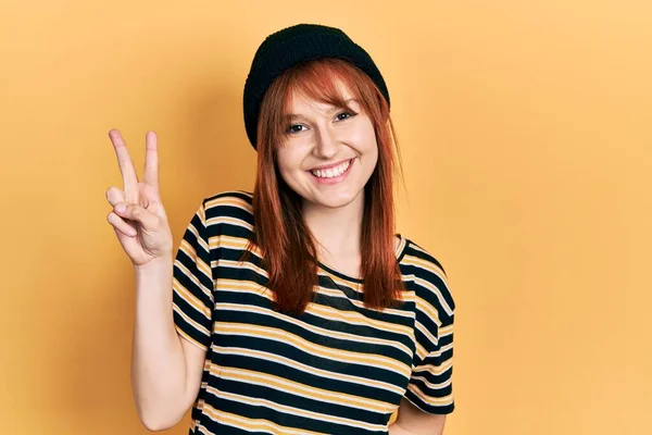 Redhead Young Woman Wearing Wool Cap Smiling Happy Face Winking — Stock Photo, Image