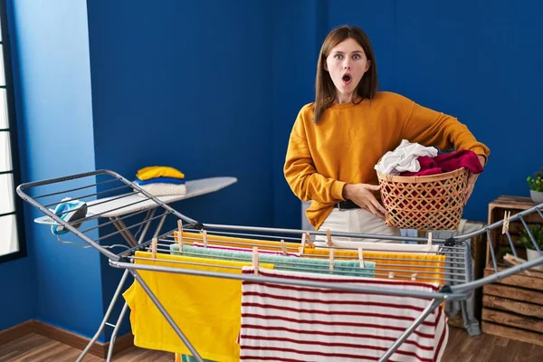 Young Brunette Woman Hanging Clothes Clothesline Scared Amazed Open Mouth — Photo