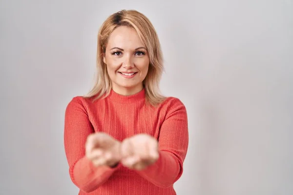 Blonde Woman Standing Isolated Background Smiling Hands Palms Together Receiving — Stok fotoğraf