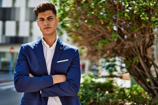 Young man relaxed wearing suit at park