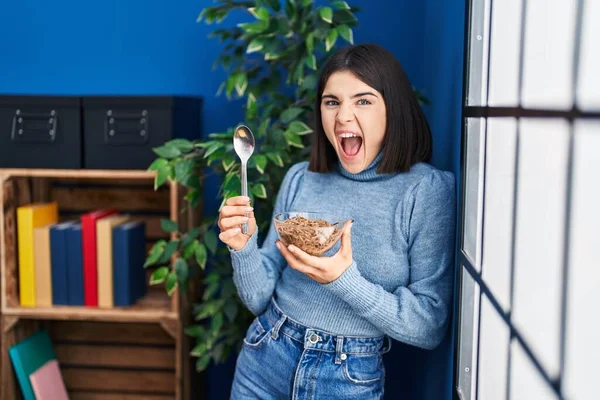 Young Hispanic Woman Eating Healthy Whole Grain Cereals Spoon Angry — Photo