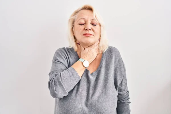 Middle Age Caucasian Woman Standing White Background Touching Painful Neck — Stok fotoğraf