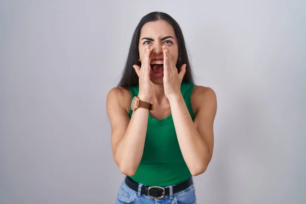 Young Woman Standing Isolated Background Shouting Angry Out Loud Hands — Stock Photo, Image