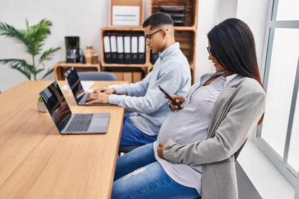 Young Latin Couple Business Workers Using Laptop Smartphone Working Office — Stock Photo, Image