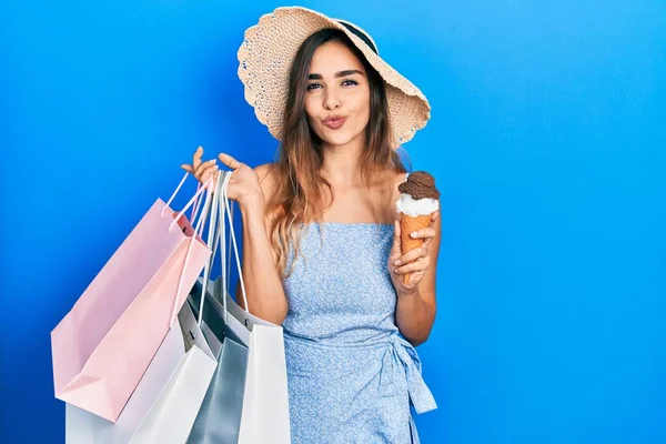 Young Hispanic Girl Holding Shopping Bags Ice Cream Looking Camera — ストック写真