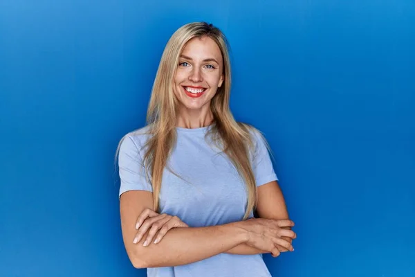 Beautiful Blonde Woman Wearing Casual Shirt Blue Background Happy Face — Stockfoto
