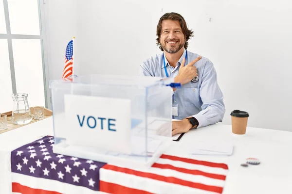 Handsome Middle Age Man Sitting Voting Stand Cheerful Smile Face — Fotografia de Stock