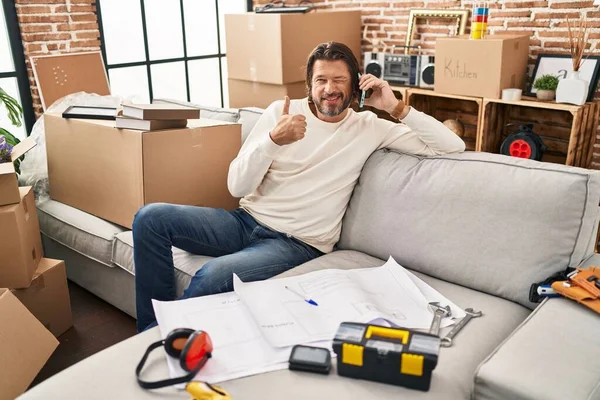 Handsome Middle Age Man Moving New Home Speaking Phone Smiling — Stockfoto