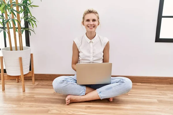 Young Blonde Woman Using Computer Laptop Sitting Floor Living Room — Stockfoto