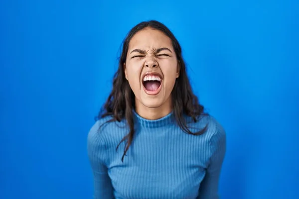 Young Brazilian Woman Standing Blue Isolated Background Angry Mad Screaming — Stock Photo, Image