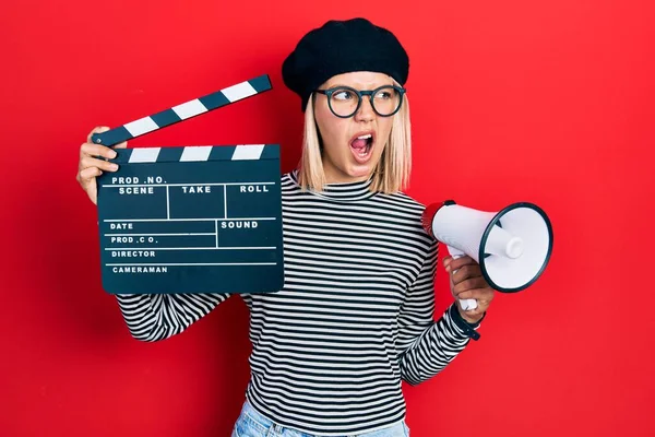 Beautiful Blonde Woman Holding Video Film Clapboard Megaphone Angry Mad — Stock fotografie