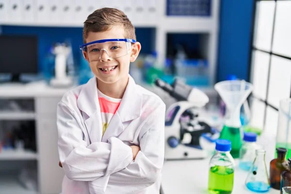 Blond Child Wearing Scientist Uniform Sitting Arms Crossed Gesture Laboratory — Stock Photo, Image