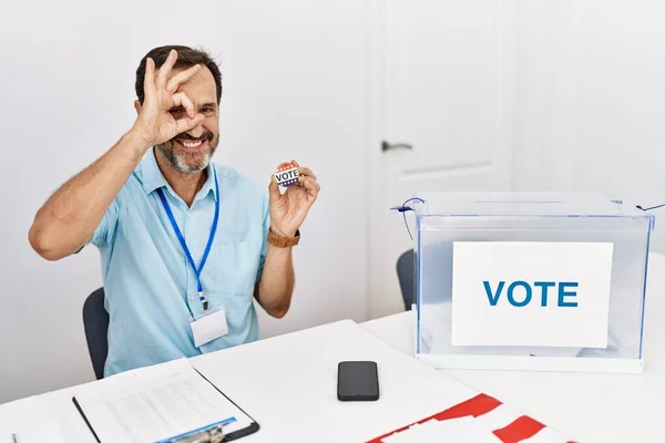 Middle Age Man Beard Sitting Ballot Holding Vote Badge Doing — Zdjęcie stockowe