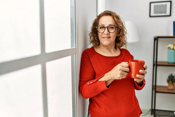 Middle Age Caucasian Woman Drinking Coffee Standing Home —  Fotos de Stock