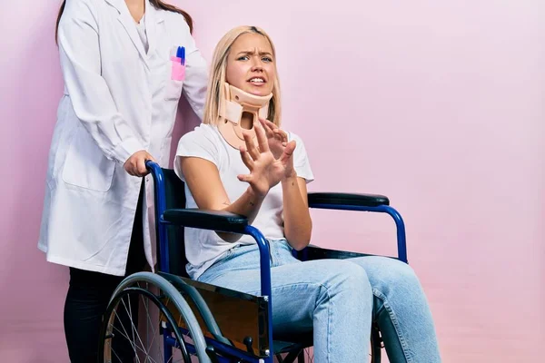 Beautiful Blonde Woman Sitting Wheelchair Collar Neck Disgusted Expression Displeased — 图库照片