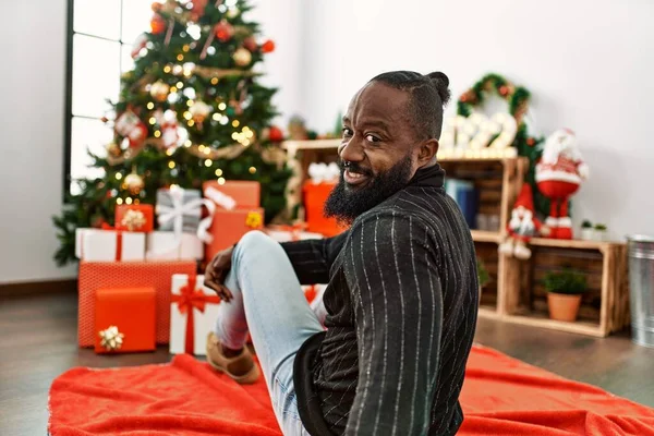 Young African American Man Smiling Confident Sitting Christmas Tree Home — 图库照片