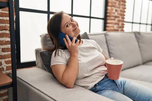 Syndrome Woman Drinking Coffee Talking Smartphone Home — Φωτογραφία Αρχείου