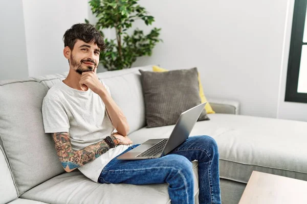 Hispanic Man Beard Sitting Sofa Looking Confident Camera Smiling Crossed — Fotografia de Stock